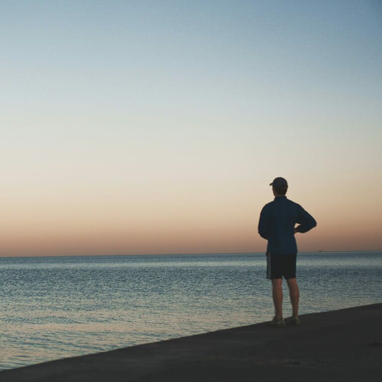 Man watching the sun set